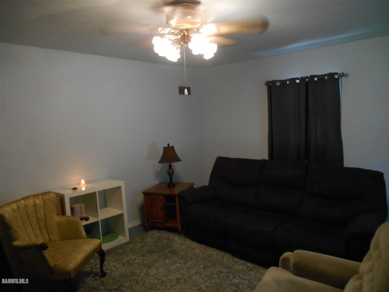 2321 Lancaster Heights Road Freeport, IL 61032 - Photo 2 of 17 a living room with furniture