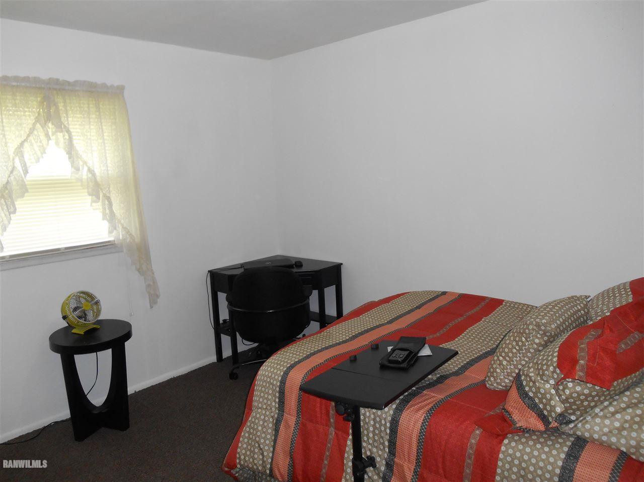 2321 Lancaster Heights Road Freeport, IL 61032 - Photo 9 of 17 a bedroom with a bed and a window