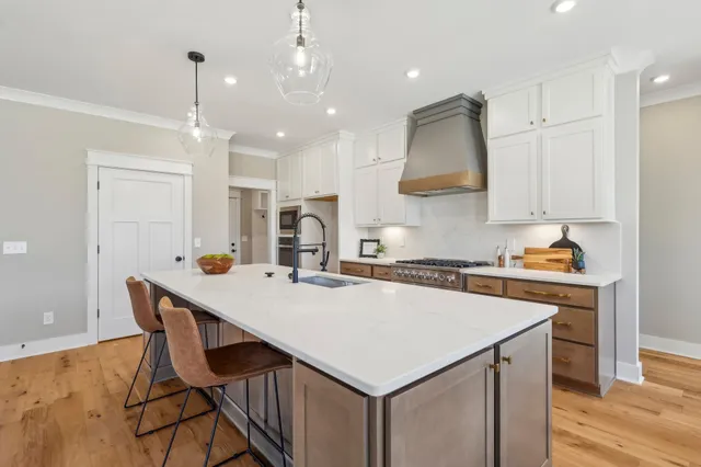 a white bath tub sitting in a bathroom