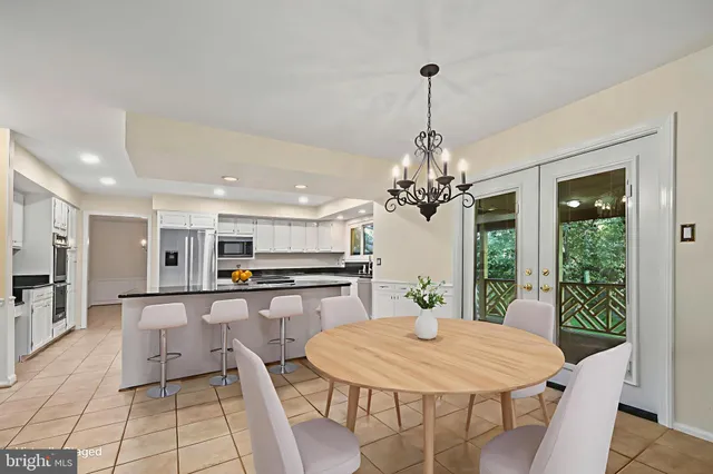 a view of a room with large windows