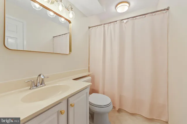 a view of a hallway with windows