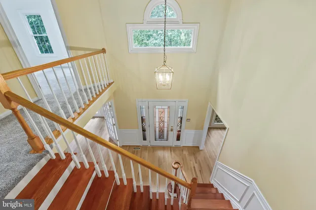 a spacious bedroom with a large bed and a window