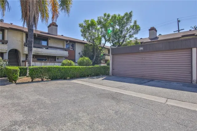 front view of a house with a street