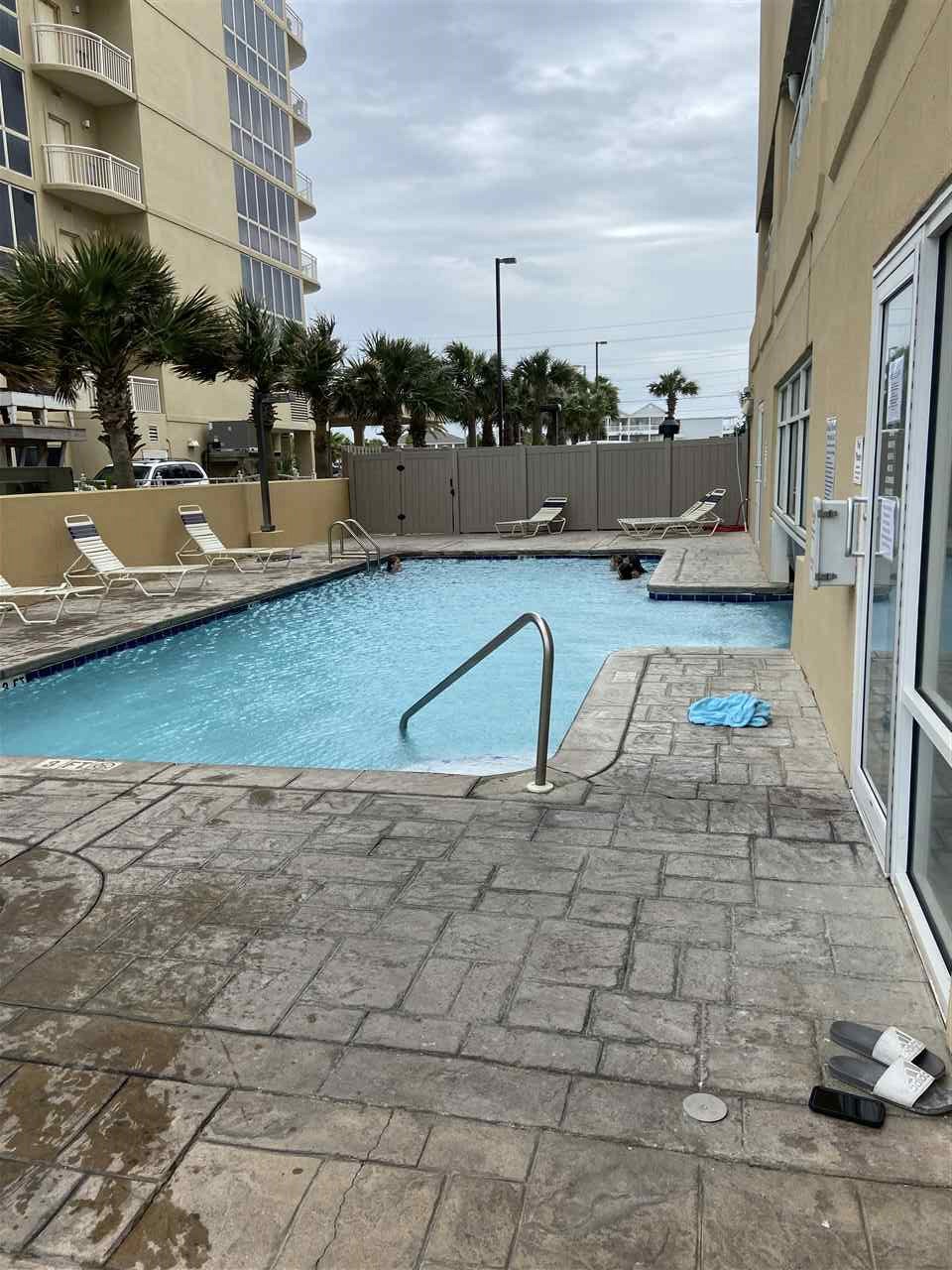 809 West Beach Boulevard, Unit 406 Gulf Shores, AL 36542 - Photo 15 of 19 Outdoor Pool