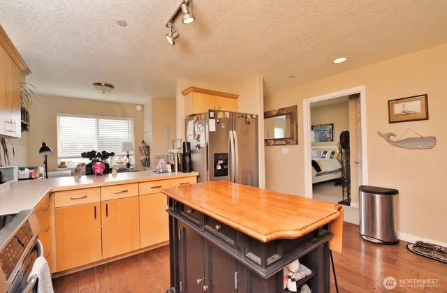 a kitchen with a stove and a microwave