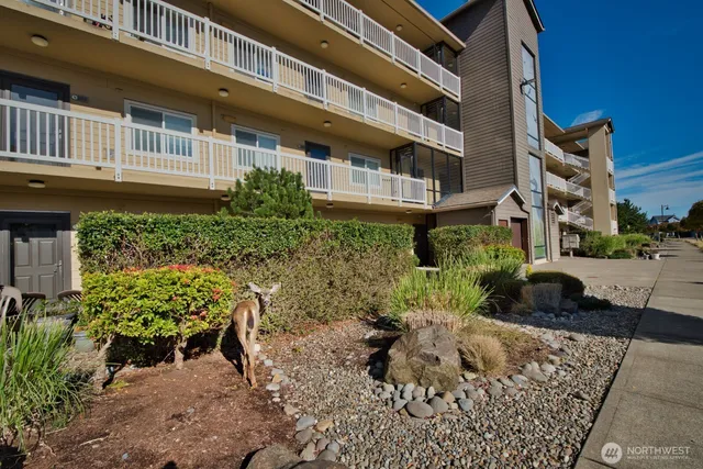 a view of a cafe with sitting area