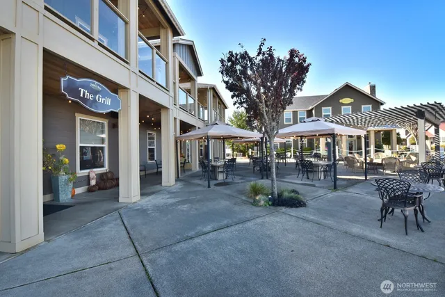 a view of a livingroom with furniture and dining room