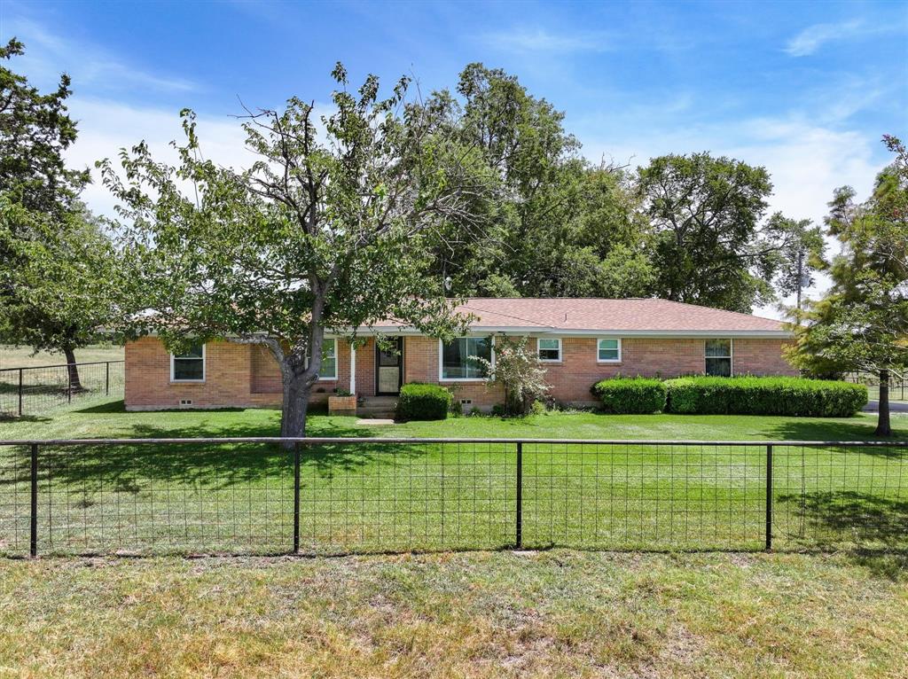 15374 Fm 2728 Terrell, TX 75161 - Photo 14 of 39 a front view of a house with a yard