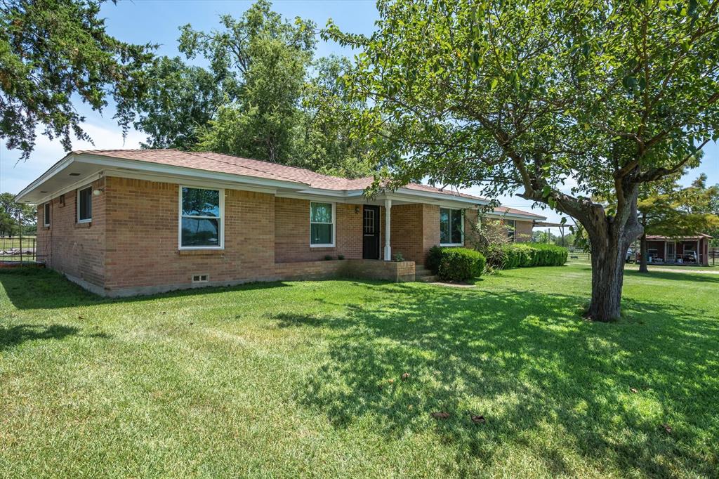 15374 Fm 2728 Terrell, TX 75161 - Photo 2 of 39 a front view of house with yard and green space