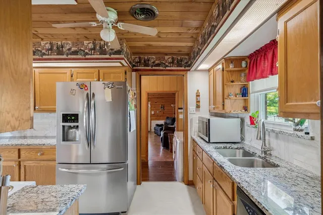 a kitchen with refrigerator and countertop