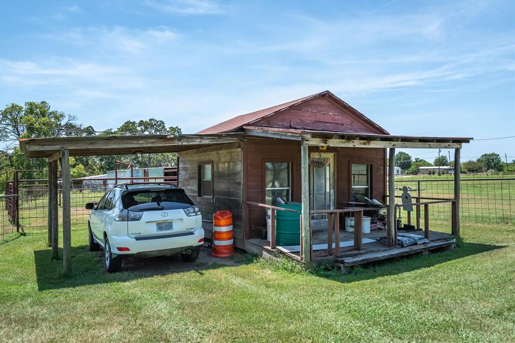 15374 Fm 2728 Terrell, TX 75161 - Photo 37 of 39 a view of a house with a garden and porch