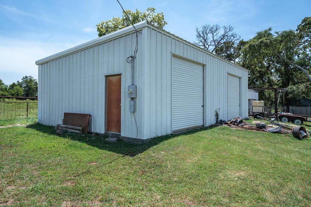 15374 Fm 2728 Terrell, TX 75161 - Photo 39 of 39 a view of a house with backyard and trees