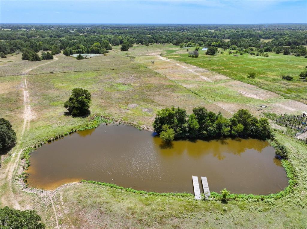 15374 Fm 2728 Terrell, TX 75161 - Photo 6 of 39 a view of a lake with a yard and lake view