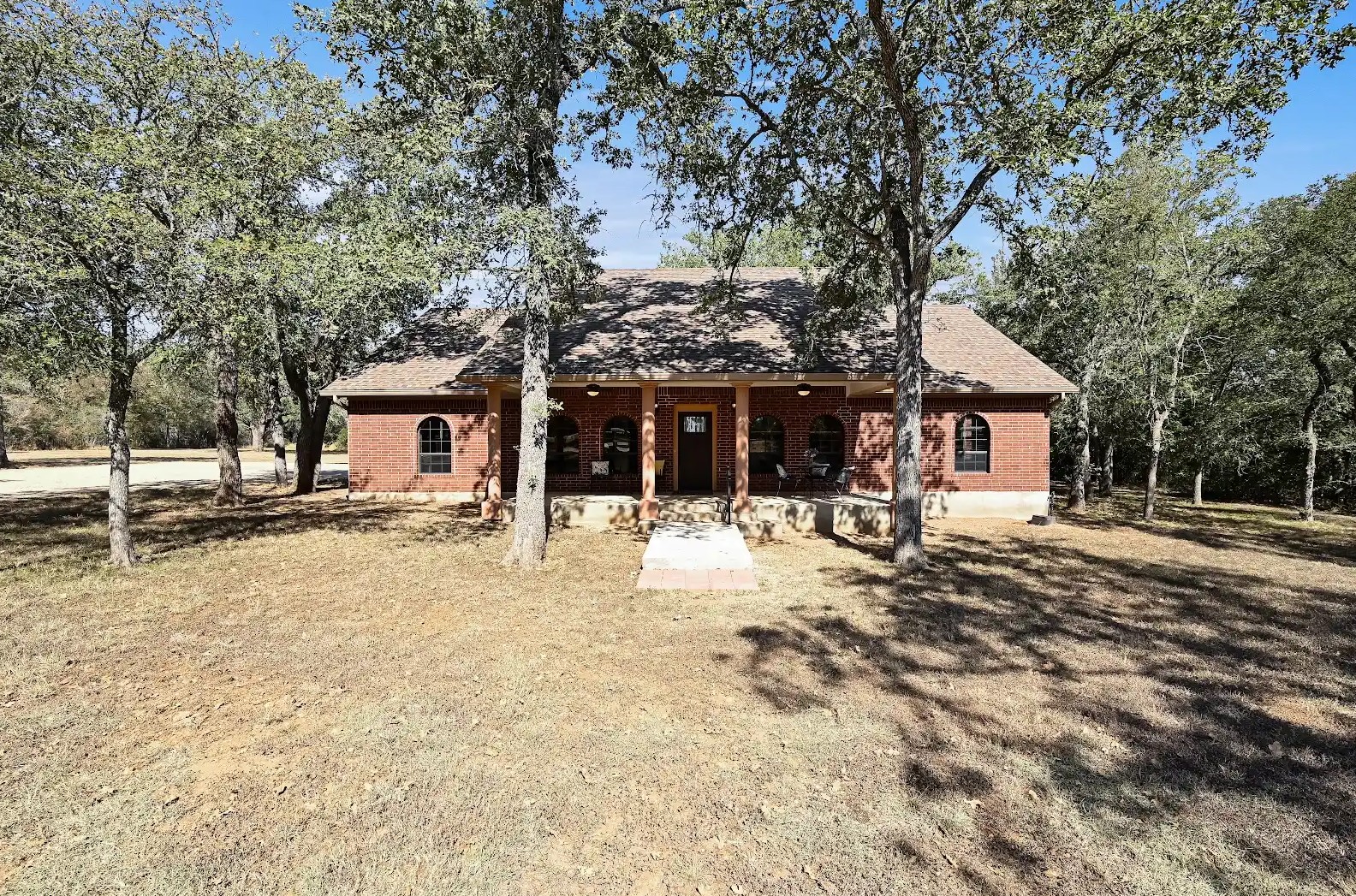 Front view of house with brick siding