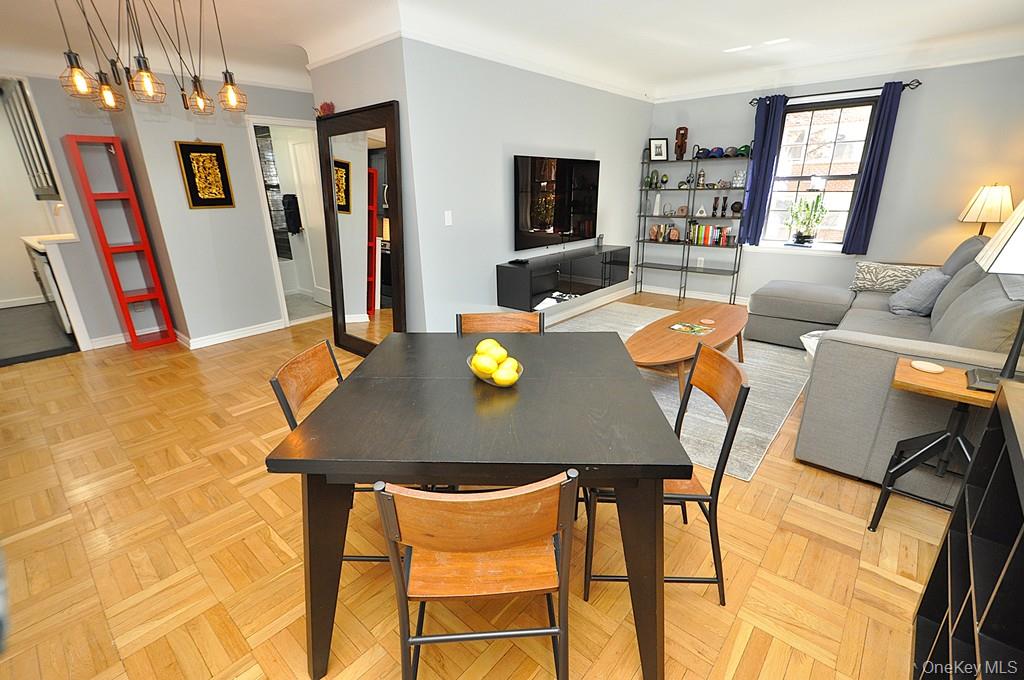 196 Garth Road, Unit 1G Scarsdale, NY 10583 - Photo 20 of 35 a view of a dining room with furniture and a window