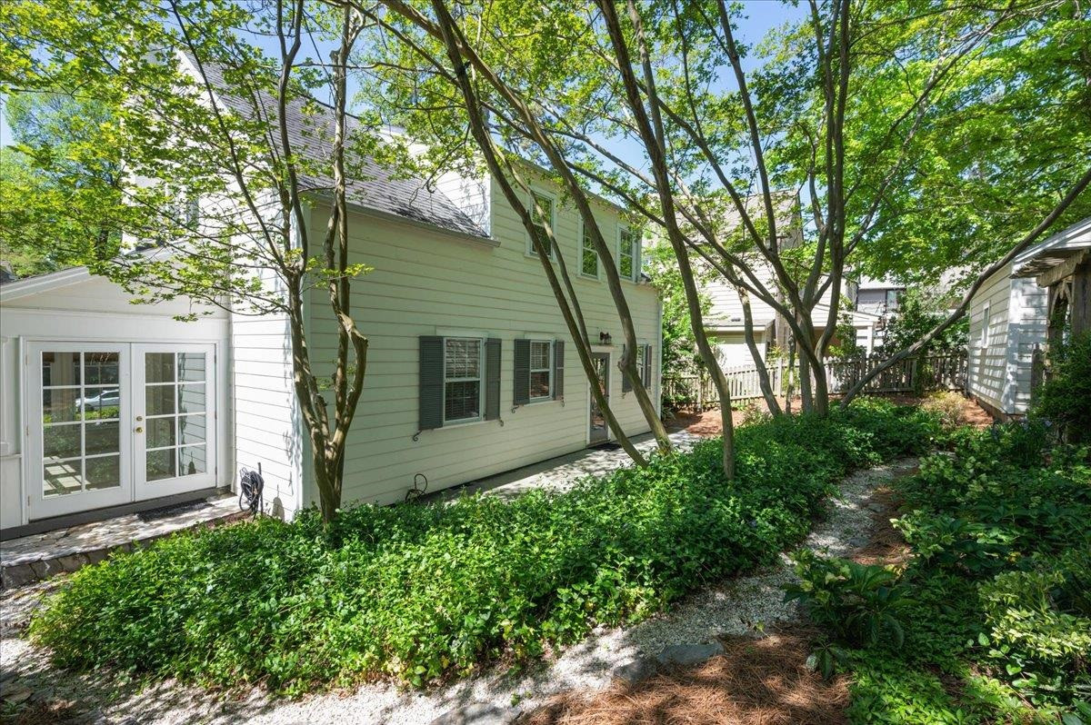 2511 Kenmore Drive Raleigh, NC 27608 - Photo 28 of 34 second small porch as well off the sunroom/office access on rear of this lovely home Exterior Back