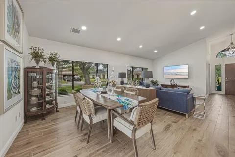 a bedroom with a bed and a table