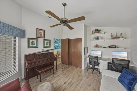 a living room with furniture and a window