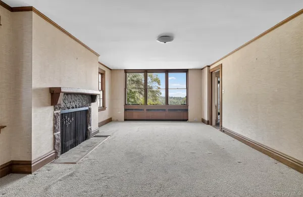 a bathroom with a toilet and shower