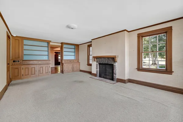 a view of front door with washer and dryer