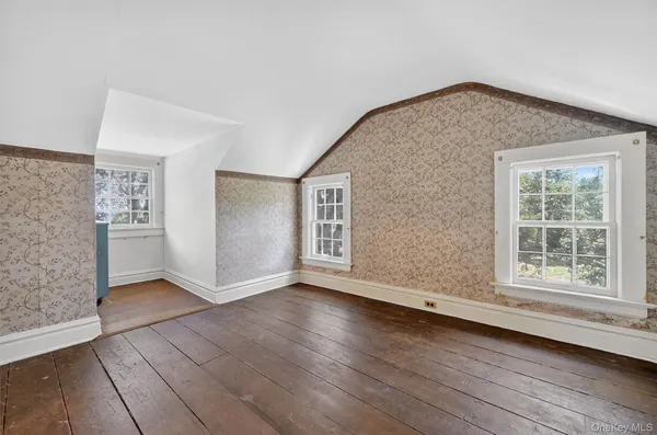 a view of a swimming pool with a yard