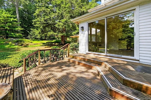 a view of a swimming pool with a yard