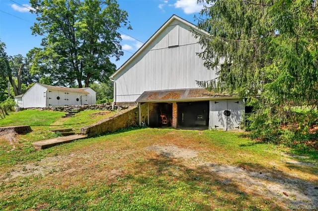 a view of a trees with a yard