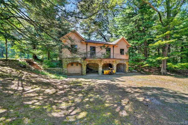 a view of a city with lush green forest