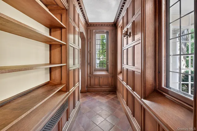 a view of an entryway with a chandelier