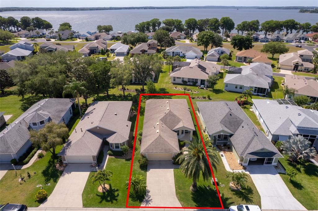 3338 Flagship Avenue Tavares, FL 32778 - Photo 1 of 1 an aerial view of a houses with outdoor space