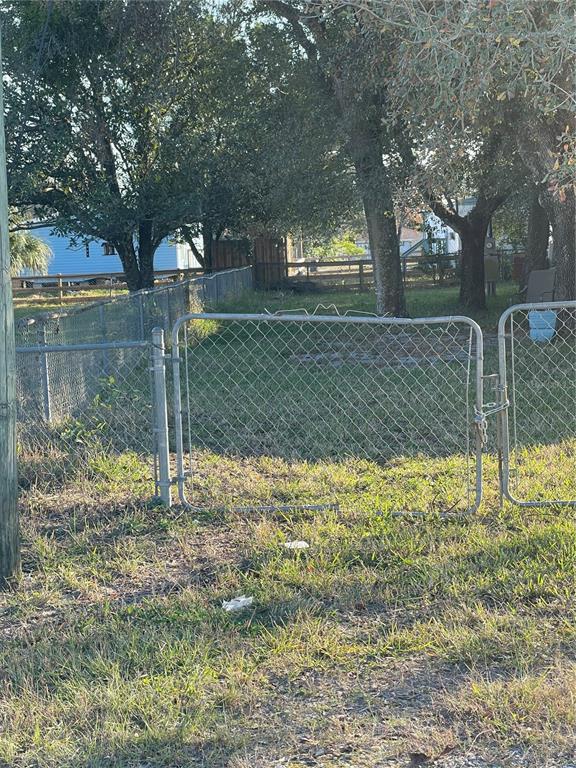 16148 Boca Raton Street Brooksville, FL 34604 - Photo 6 of 7 a view of a backyard
