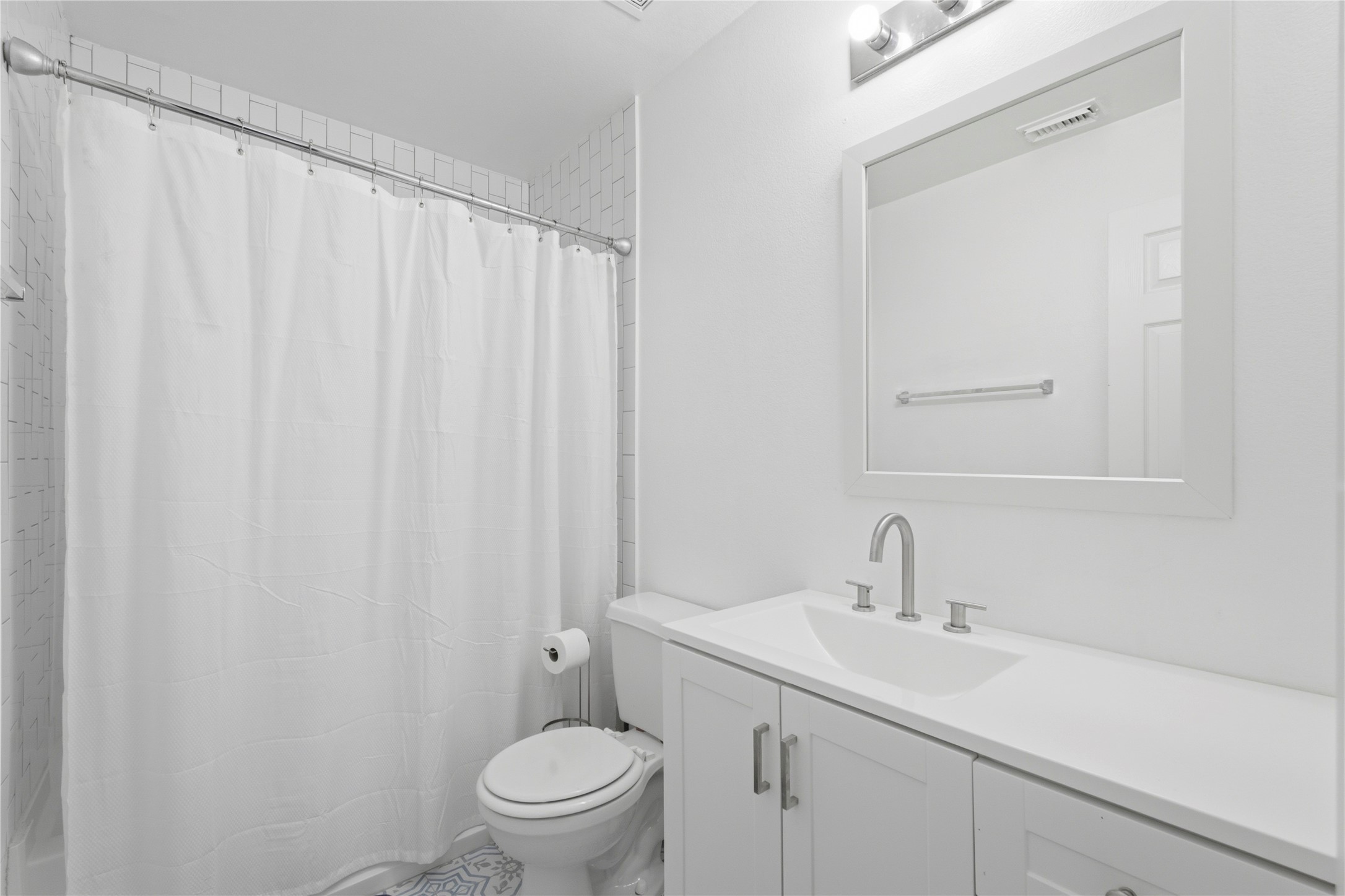 3946 Mossy Pl Lane Spring, TX 77388 - Photo 12 of 17 Hall bath upstairs - updated 3 years ago and offers plenty of storage.