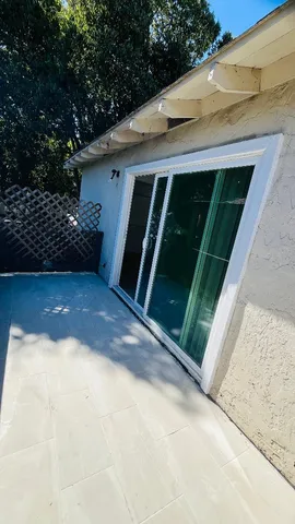 a view of backyard with garage
