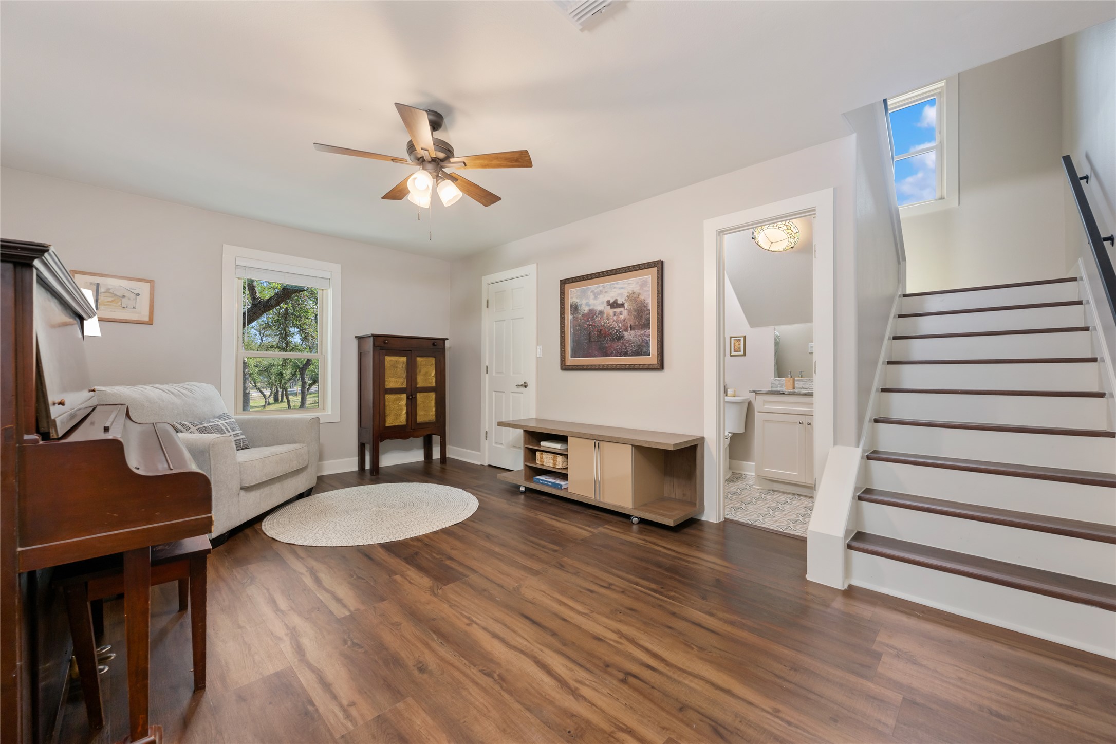 1276 Canyon Crossing View Dripping Springs, TX 78620 - Photo 15 of 33 a living room with furniture and a wooden floor