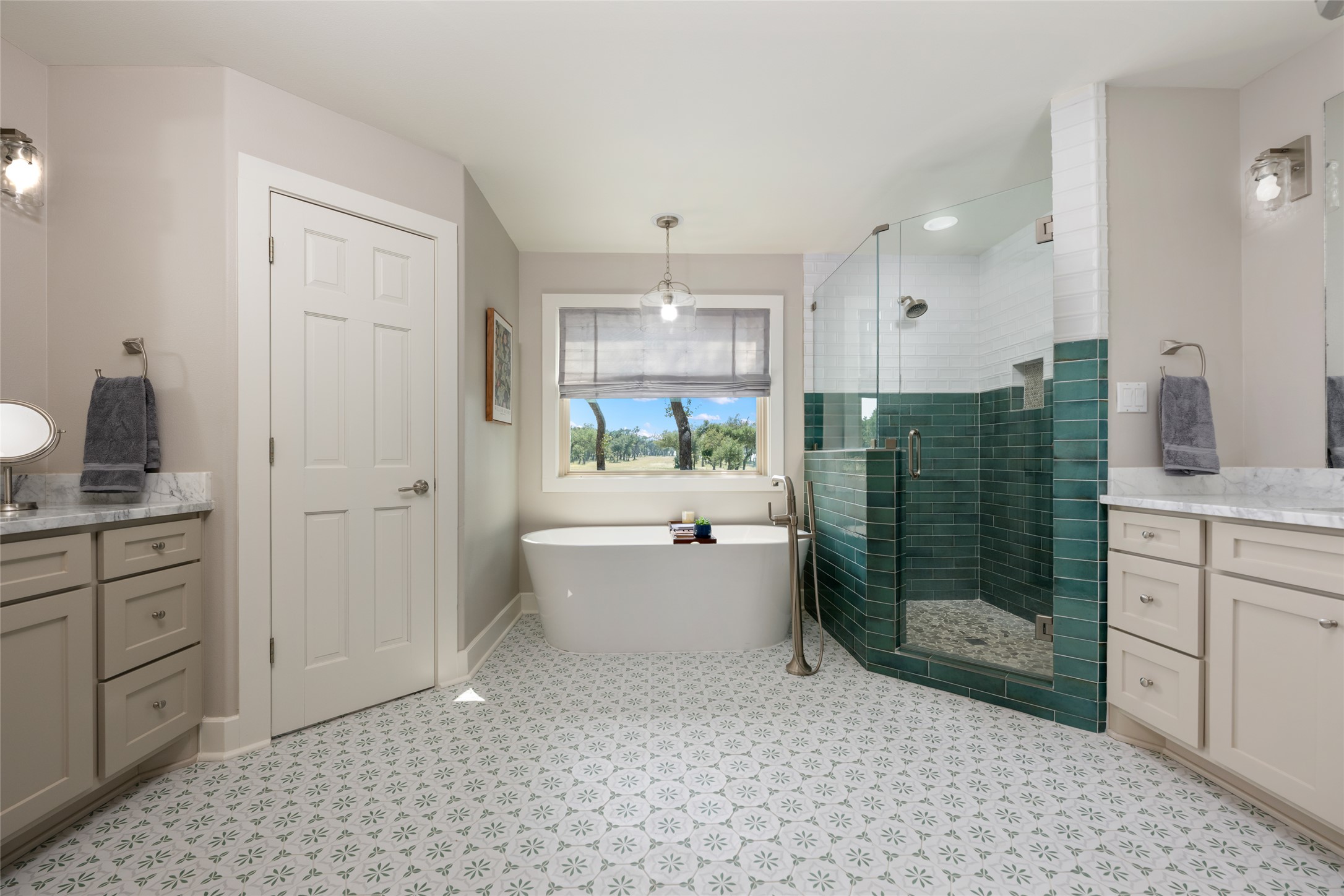 1276 Canyon Crossing View Dripping Springs, TX 78620 - Photo 16 of 33 a bathroom with a sink a toilet and shower
