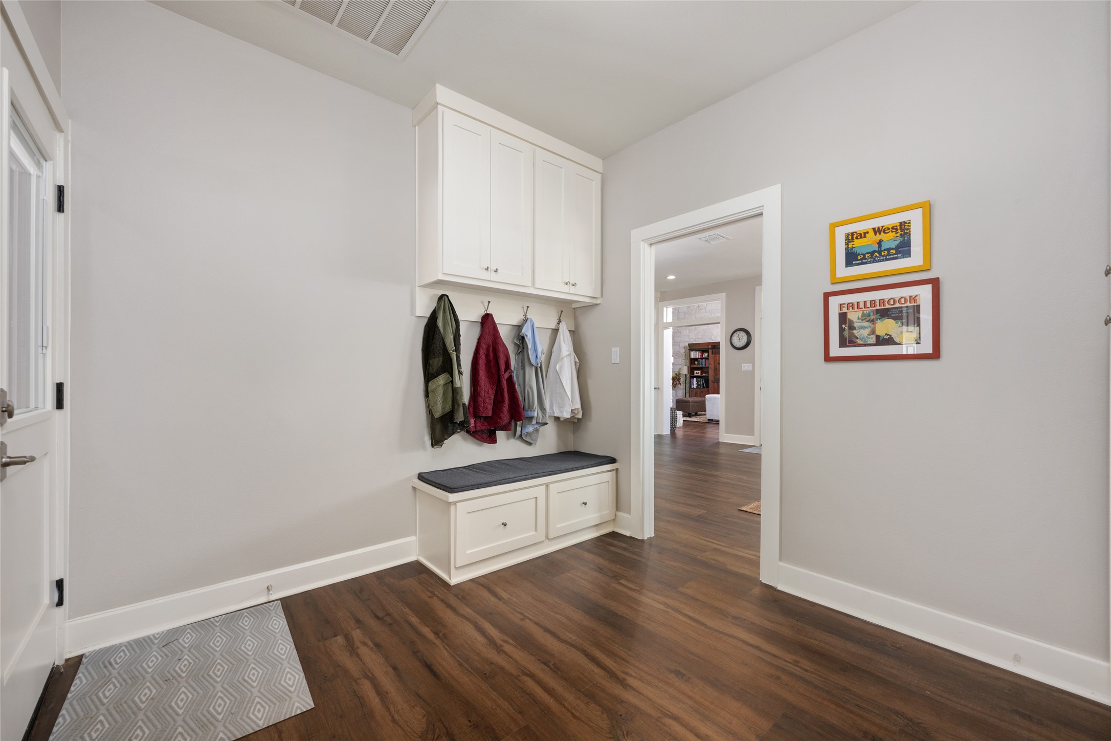 1276 Canyon Crossing View Dripping Springs, TX 78620 - Photo 18 of 33 a view of walk in closet with clothes and shoes