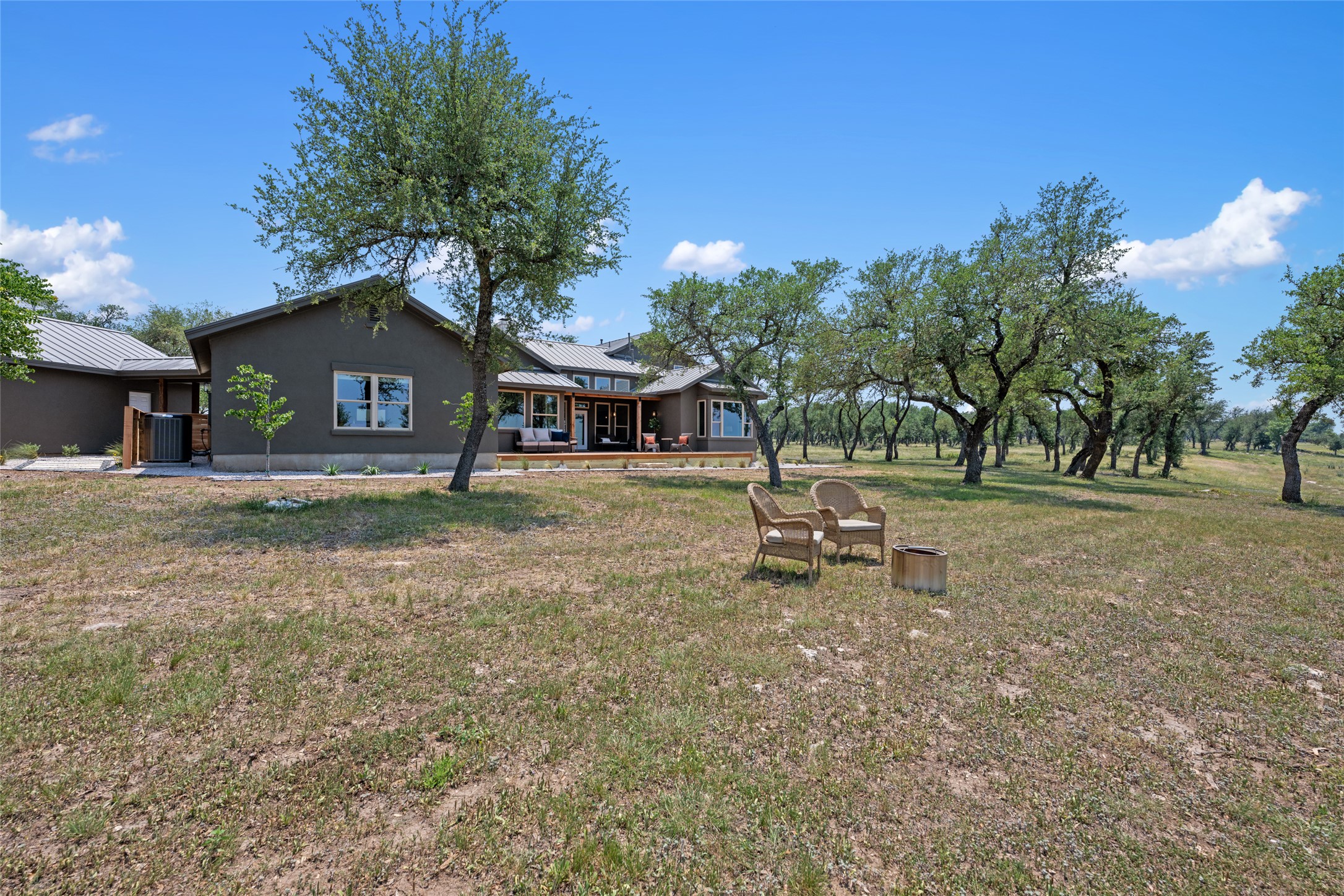 1276 Canyon Crossing View Dripping Springs, TX 78620 - Photo 23 of 33 a house view with a garden space