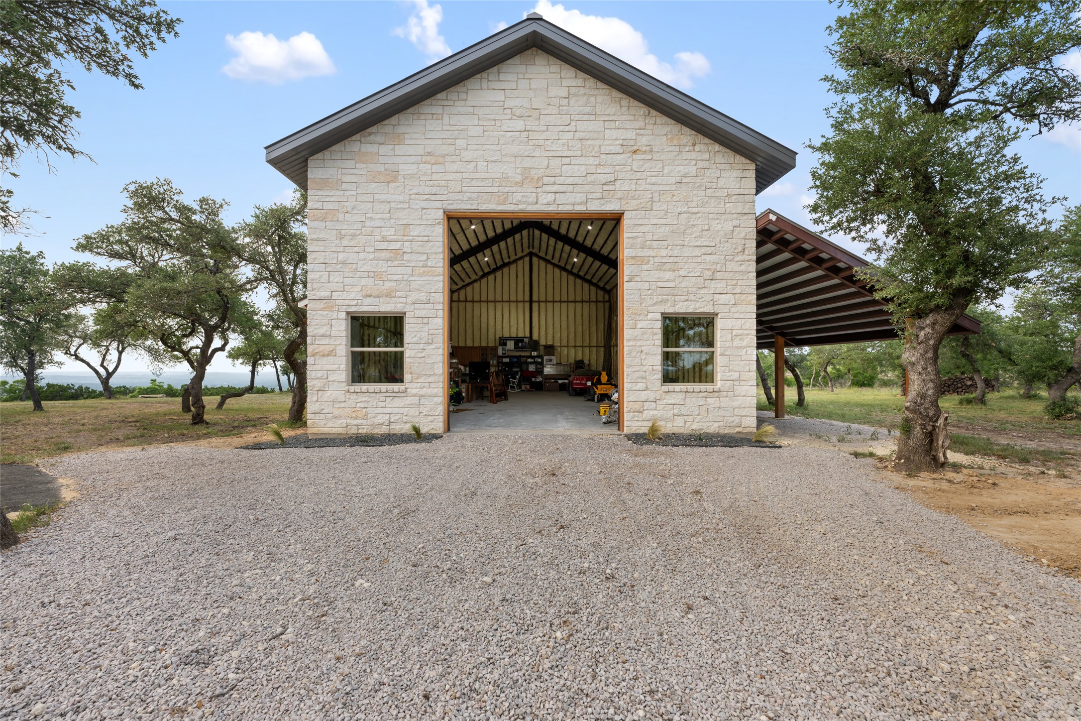 1276 Canyon Crossing View Dripping Springs, TX 78620 - Photo 26 of 33 a view of a house with a yard