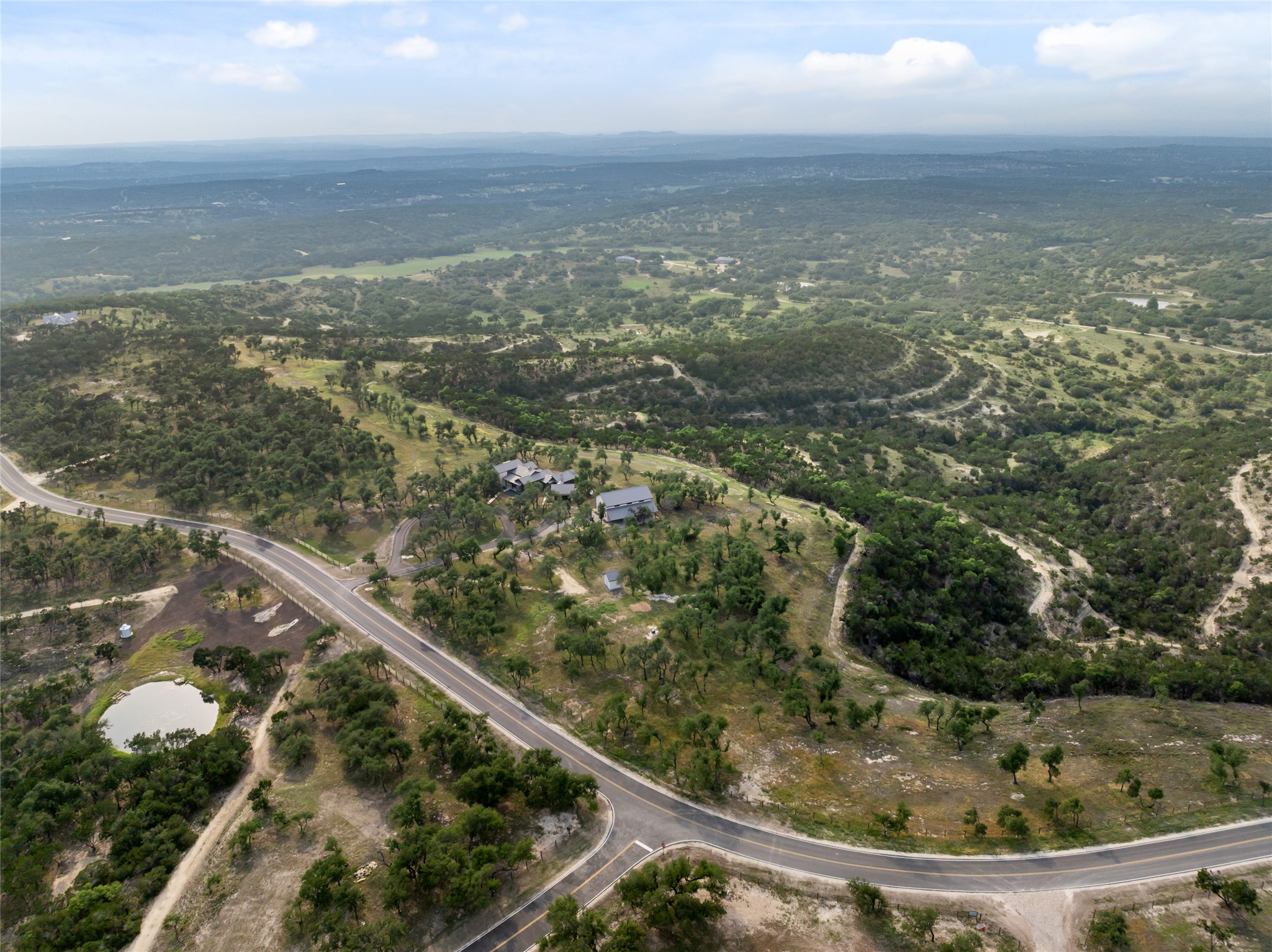 1276 Canyon Crossing View Dripping Springs, TX 78620 - Photo 30 of 33 a view of a lake from a balcony
