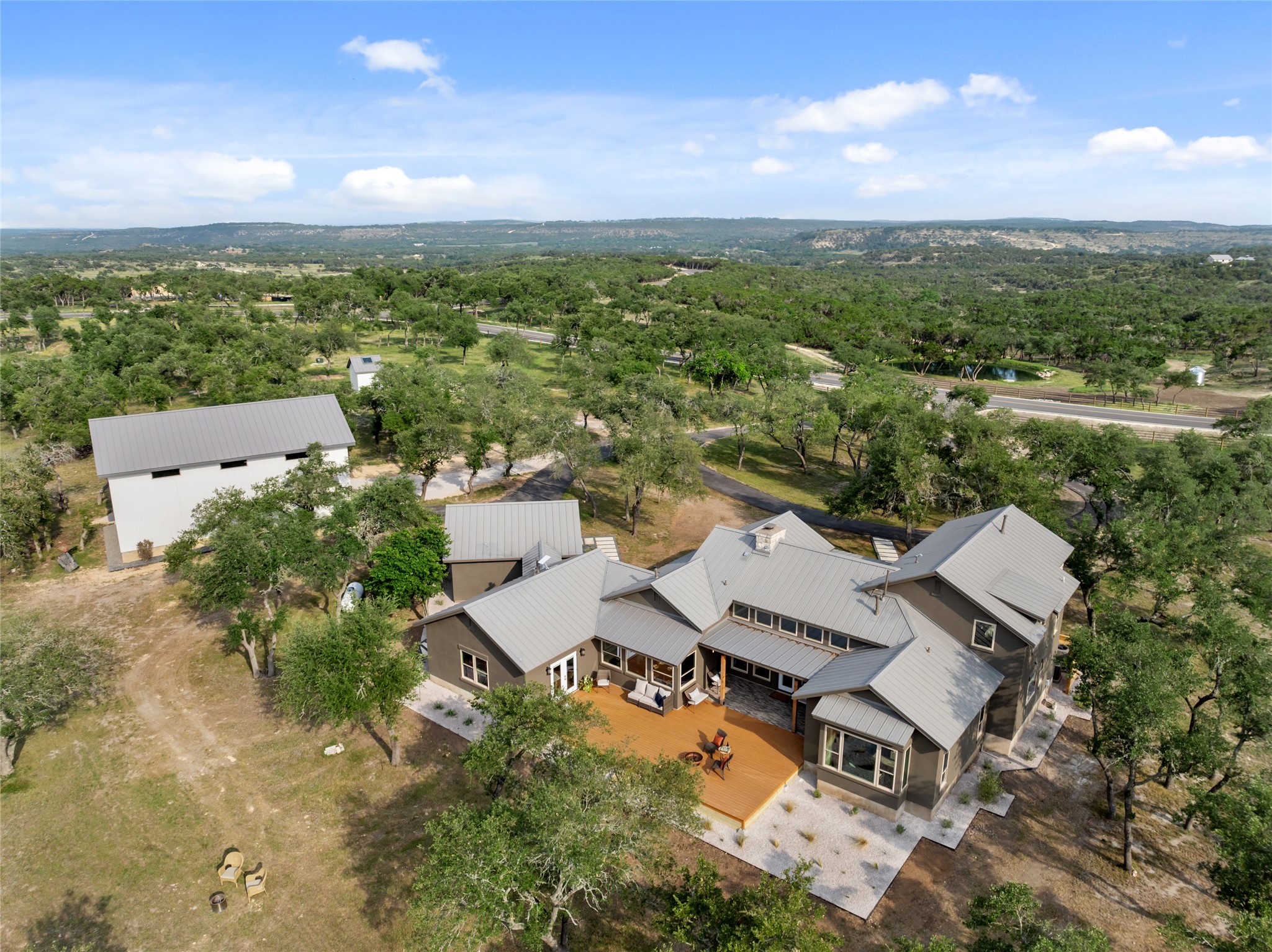 1276 Canyon Crossing View Dripping Springs, TX 78620 - Photo 31 of 33 an aerial view of multiple house