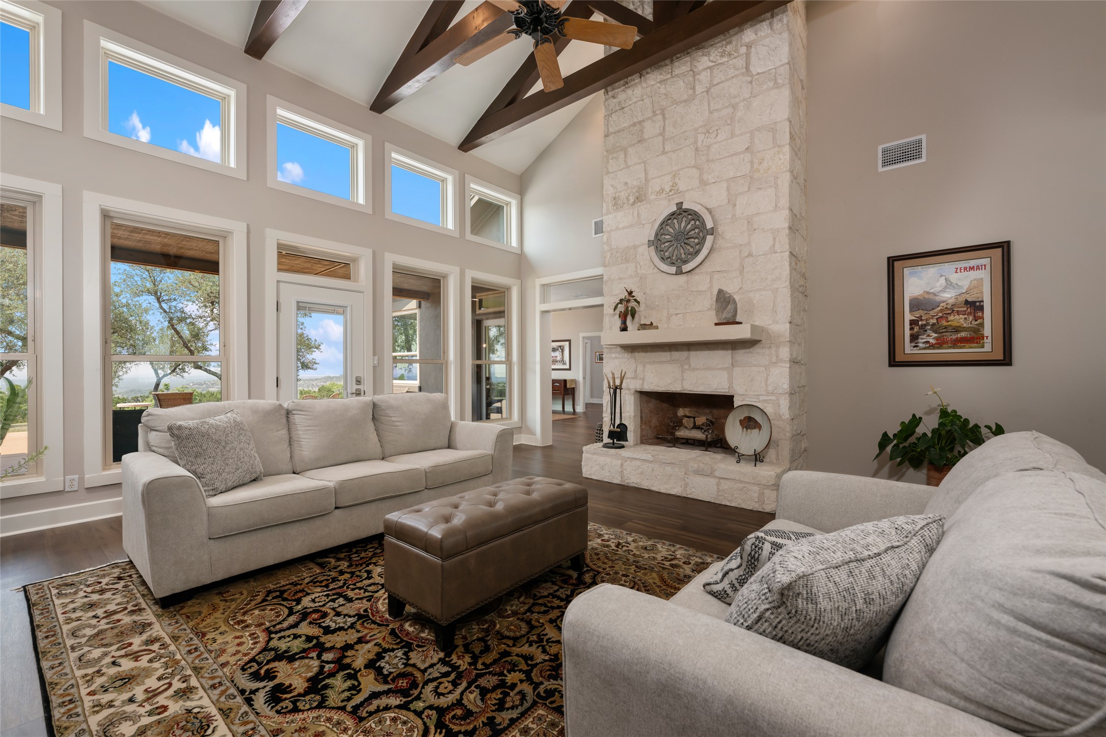 1276 Canyon Crossing View Dripping Springs, TX 78620 - Photo 5 of 33 a living room with furniture and a fireplace