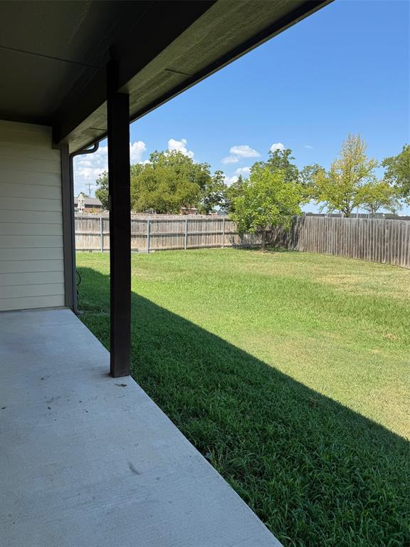 792 East Northside Drive Pilot Point, TX 76258 - Photo 16 of 18 a view of a field with a big yard