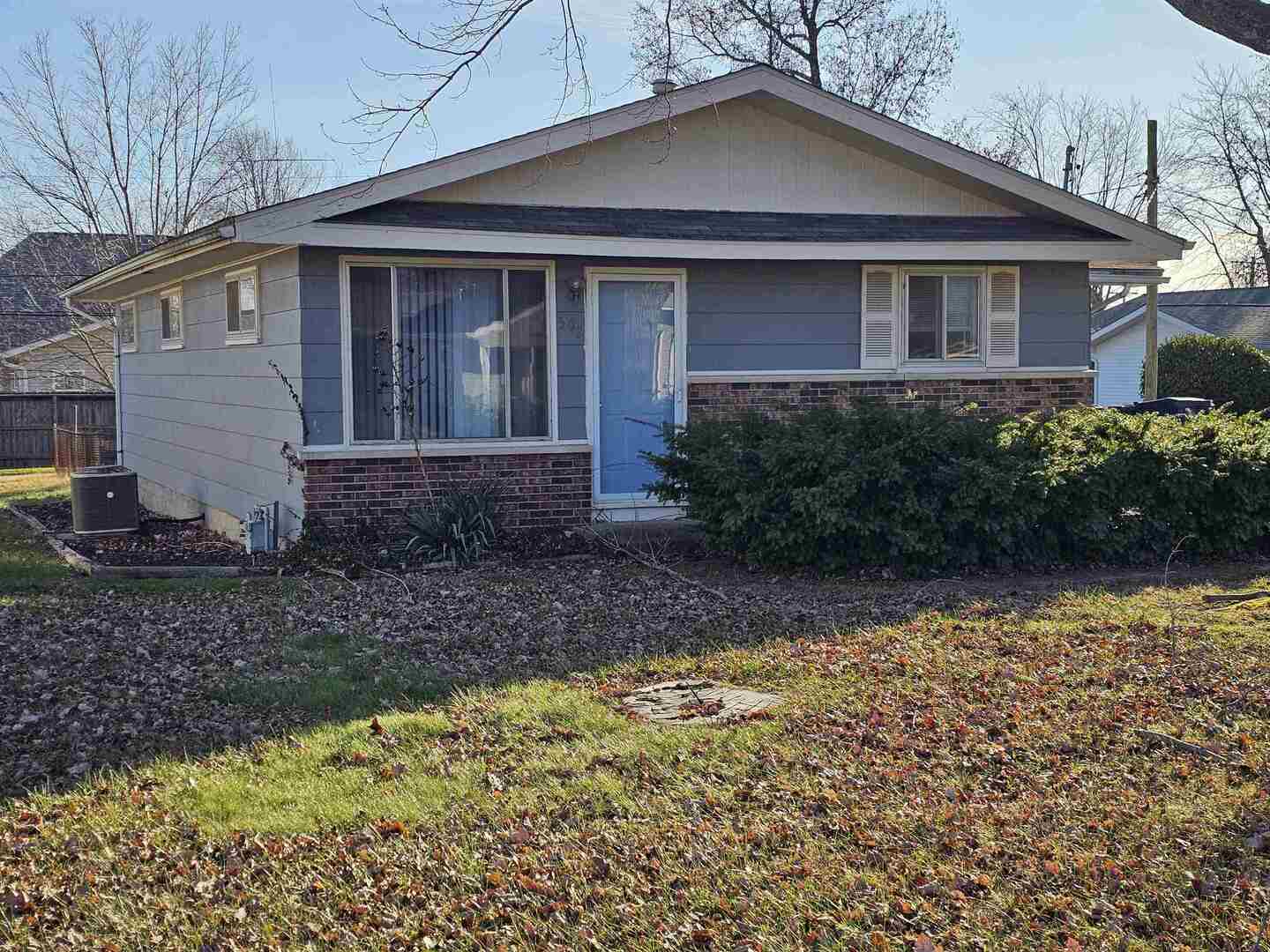 302 Marteeny Street Mount Vernon, IL 62864 - Photo 2 of 15 a front view of a house with garden