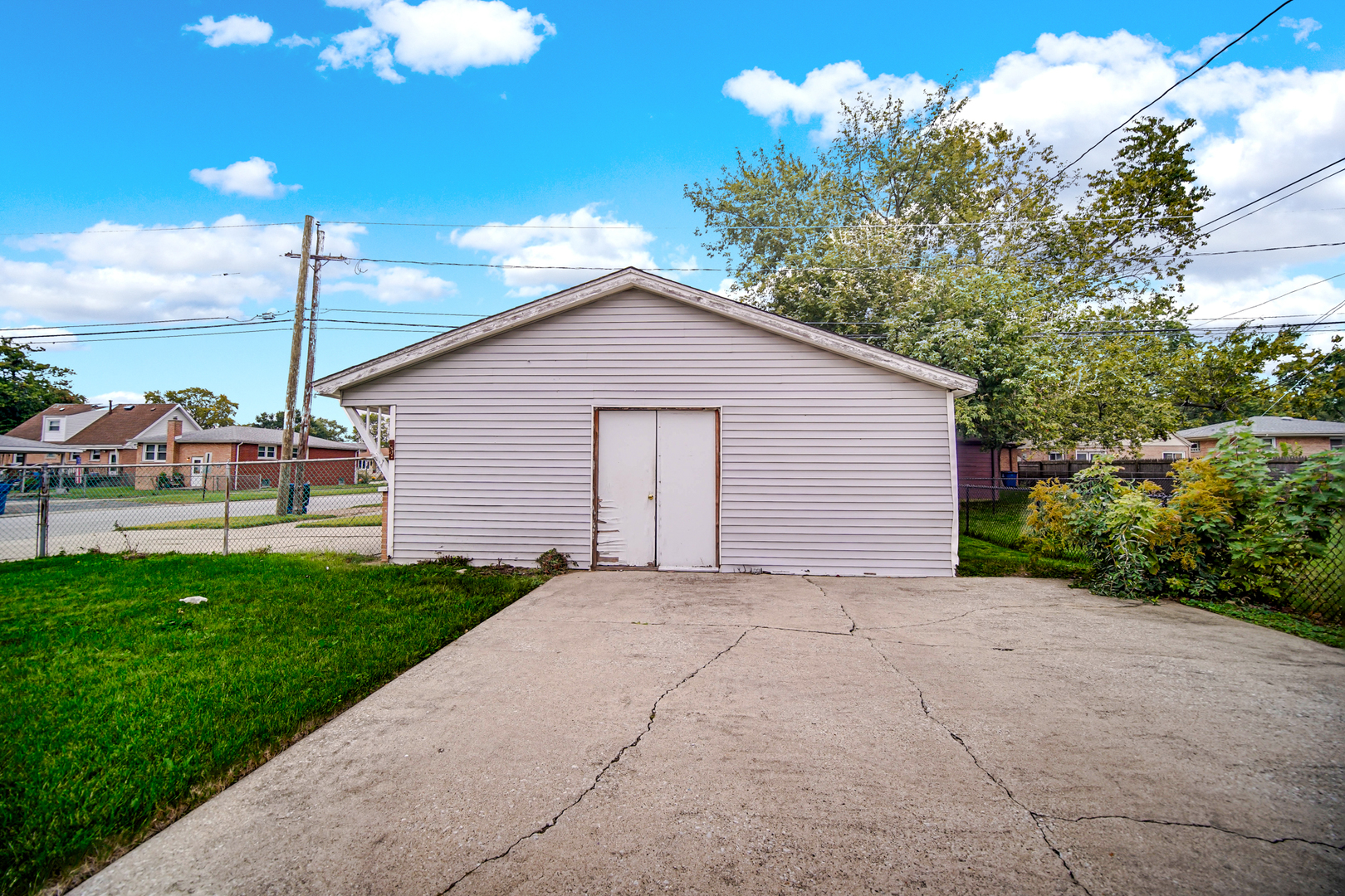 14501 Tripp Avenue Midlothian, IL 60445 - Photo 15 of 19 a view of a house with backyard and garden