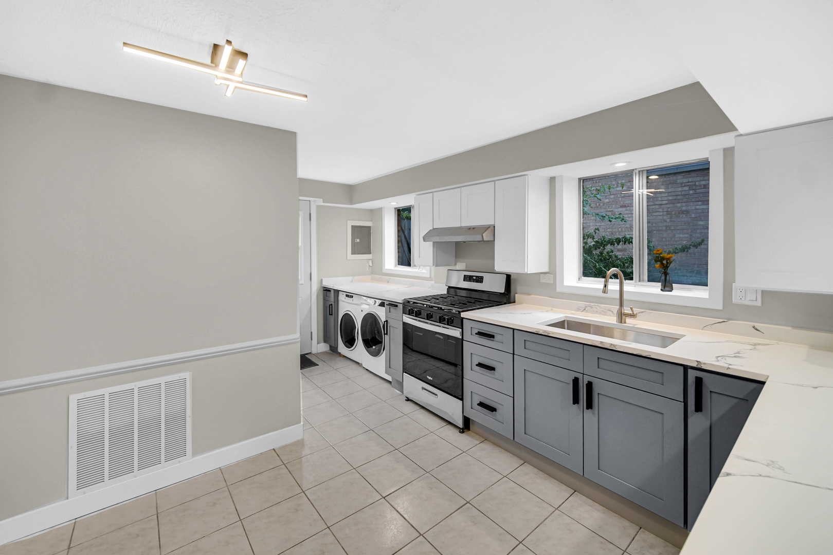 14501 Tripp Avenue Midlothian, IL 60445 - Photo 9 of 19 a kitchen with stainless steel appliances granite countertop a sink and cabinets