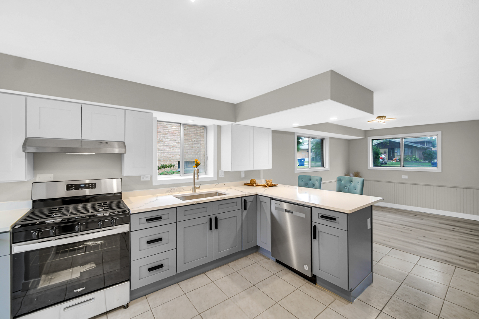 14501 Tripp Avenue Midlothian, IL 60445 - Photo 10 of 19 a kitchen with a sink stove and cabinets