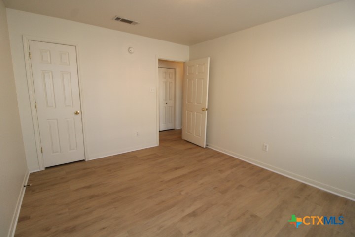 305 Cedar Ridge Drive, Unit B Nolanville, TX 76559 - Photo 14 of 14 a view of an empty room