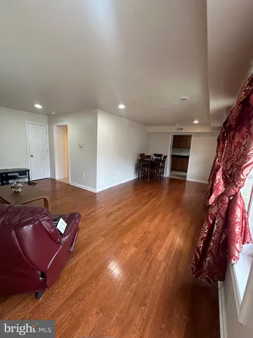 a room with furniture and air hockey table