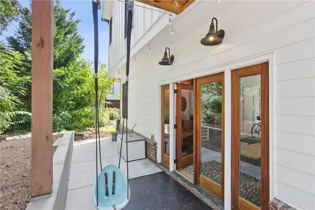 a view of an entryway of house and living room