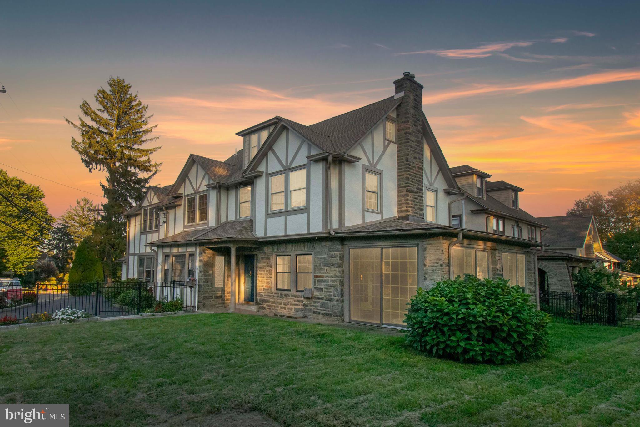 501 East Manoa Road Havertown, PA 19083 - Photo 1 of 42 a front view of a house with a garden